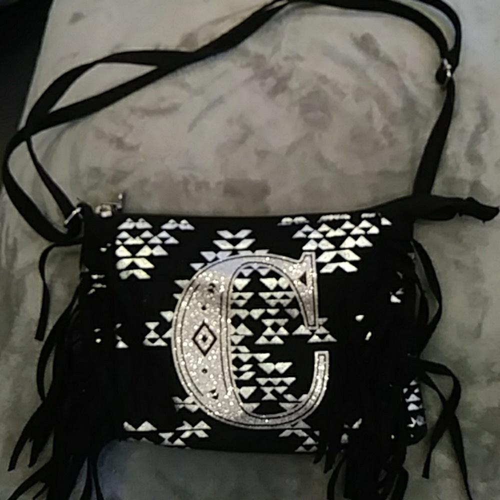 Justice fashion bag black and sliver with the lett